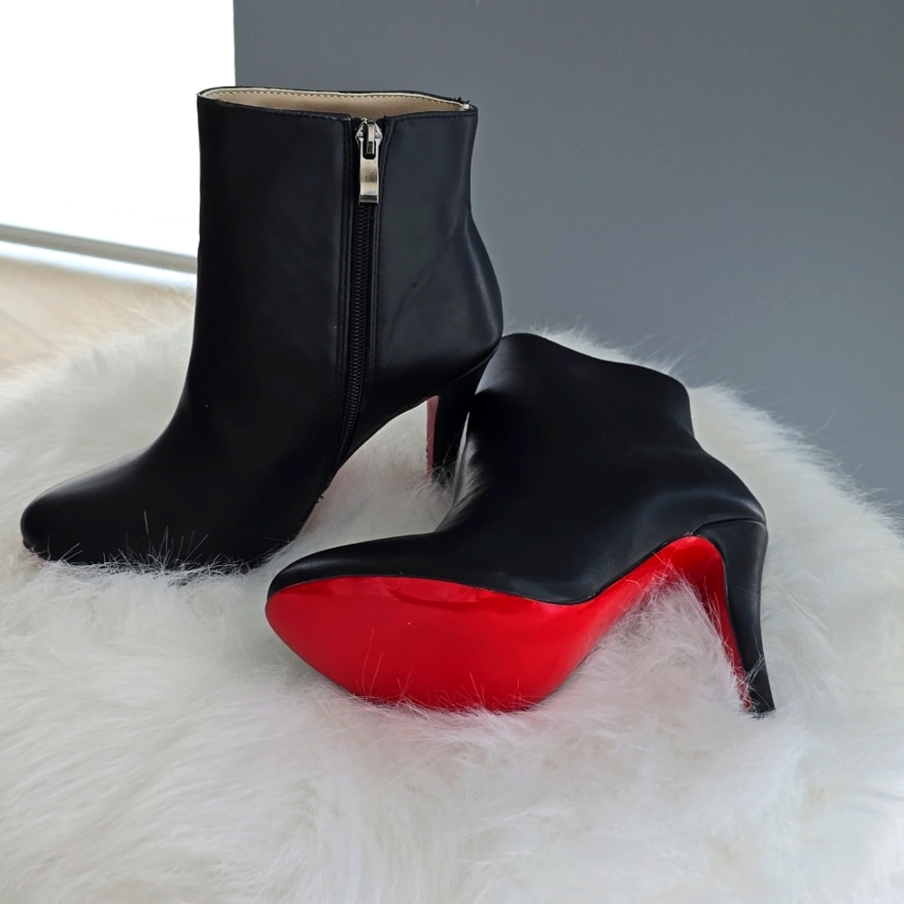 Christian Louboutin black boots